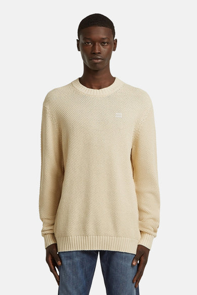 T-shirt écru avec col rond de G-Star RAW, avec une fine texture tricotée sur un fond.