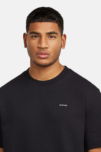 T-shirt noir à manches courtes de G-Star RAW, avec une subtile texture gaufrée.