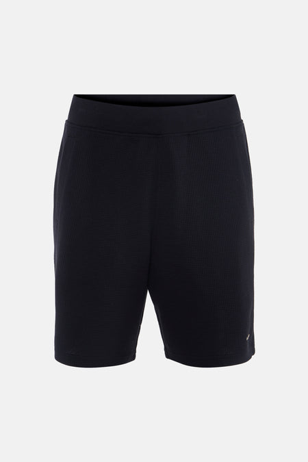Short noir G-Star RAW à texture gaufrée, taille côtelée et petit logo sur la jambe droite.
