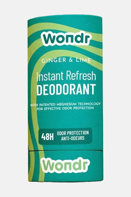 Déodorant vert avec arôme de gingembre et de citron de Wondr, doté d'un motif à rayures ondulées en vert clair sur un fond plus clair.