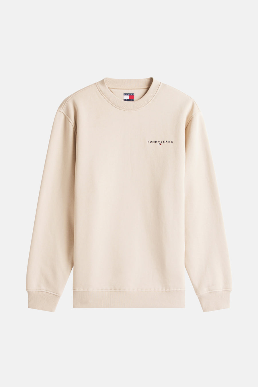 Beige Tommy Jeans sweater op witte achtergrond.