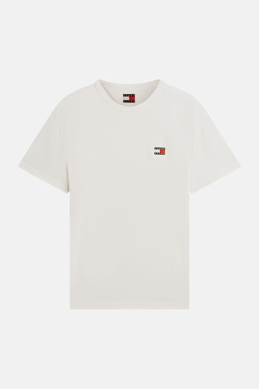 T-shirt à manches courtes de couleur crème TOMMY JEANS avec petit logo drapeau sur la poitrine.
