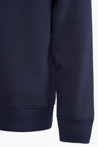 Pull-over bleu de TOMMY JEANS, avec des manches longues et des bordures côtelées.