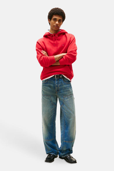 Pull-over rouge avec capuche de Tommy Jeans, à longues manches et coupe décontractée.