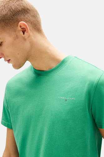 T-shirt vert à manches courtes de TOMMY JEANS, avec un petit logo sur la poitrine et un design uni.