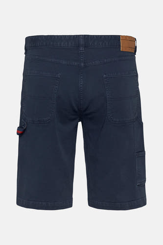 Jean court bleu de Tommy Jeans, avec des poches arrière et une poche à outils.