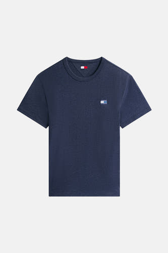 T-shirt bleu à manches courtes de TOMMY JEANS, avec un petit logo de marque sur la poitrine.