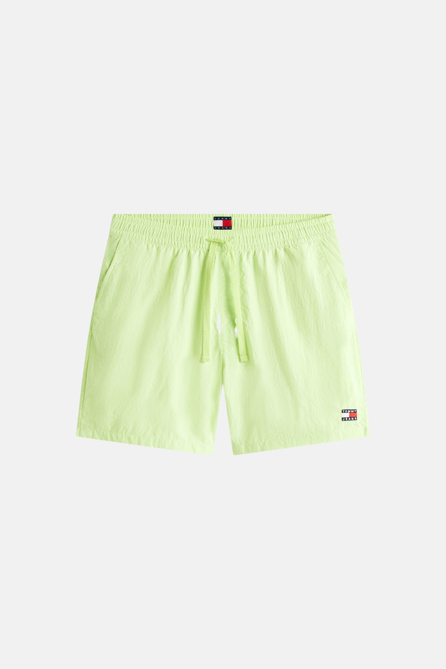 Short vert lime de TOMMY JEANS avec taille élastique, cordon de serrage, deux poches latérales et écusson logo.