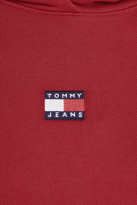Gilet rouge avec capuche de TOMMY JEANS, avec le logo sur la poitrine et un motif uni.