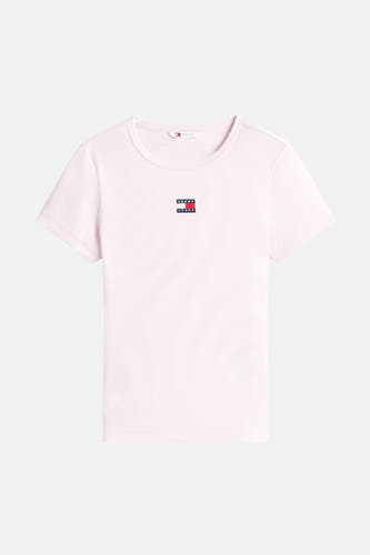 T-shirt rose à manches courtes de TOMMY JEANS, avec une texture côtelée et un petit logo sur la poitrine.