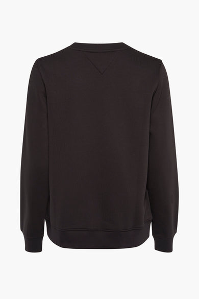 Pull-over noir avec col rond de TOMMY JEANS, dos avec détail subtil V à la nuque.