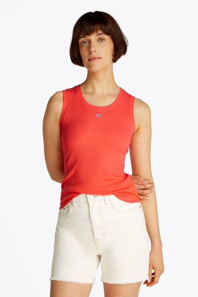 T-shirt orange à manches courtes de TOMMY JEANS, avec une texture rayée et un petit logo.