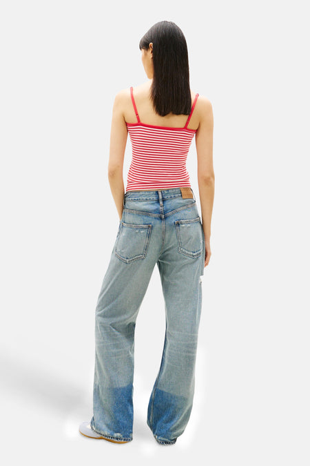 Haut multicolore de TOMMY JEANS avec des rayures rouges et blanches, vue de dos.