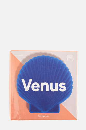 Boîte à bijoux bleue en forme de coquille de DOIY avec du texte "Venus" blanc sur une boîte avec des surfaces colorées.