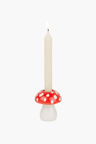 Chandelier de champignon rouge DOIY avec des taches blanches et une bougie blanche.