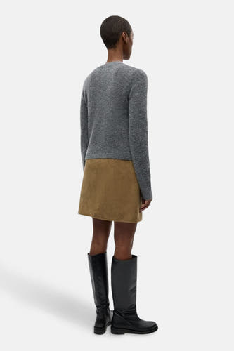 Veste grise d'ENVII, avec des manches longues et un design simple.