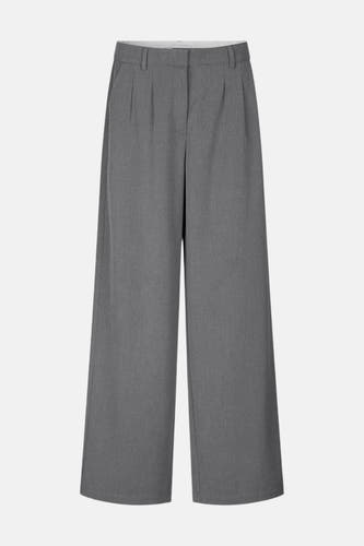 Pantalon gris d'ENVII, avec des jambes larges et des plis à l'avant.