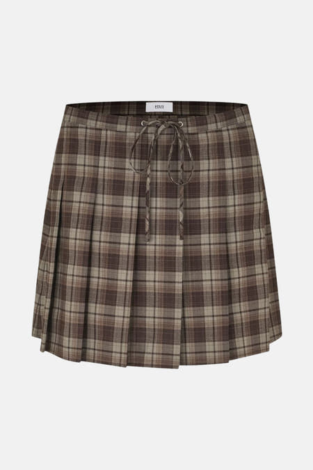Jupe courte brune d'ENVII avec un motif tartan rayé et des détails de ruban.