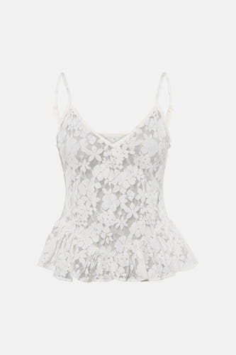 Camisole en dentelle blanche ENVII à motif floral et ourlet à volants évasé.