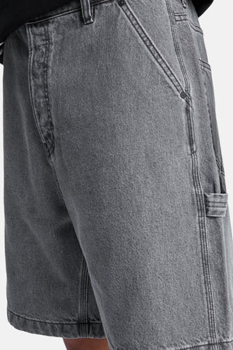 Short en jean gris de DC SHOES, avec poches latérales et poche utilitaire.