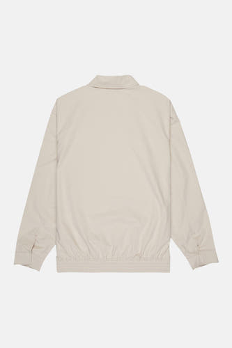 Veste courte beige de DC SHOES, à manches longues et à ourlet côtelé, vue de dos.