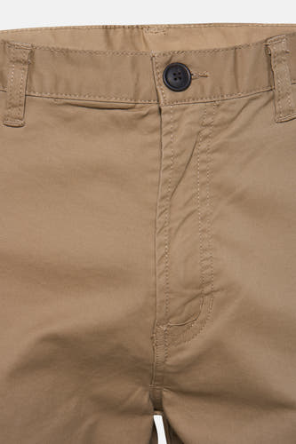 Short beige from ELEMENT, with a black button and stitches around the closure.
