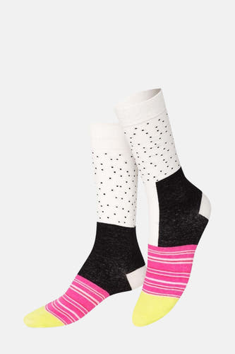 Chaussettes multicolores d'EAT MY SOCKS, avec des points, des rayures et des blocs de couleur.