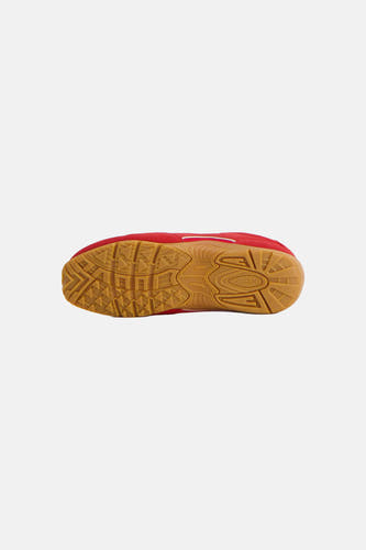 Baskets rouges de TOMMY JEANS, avec une semelle marron à profil géométrique.