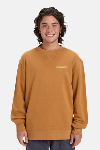Pull-over orange avec col rond de Quiksilver, avec une petite impression textuelle sur la poitrine et des manches longues.