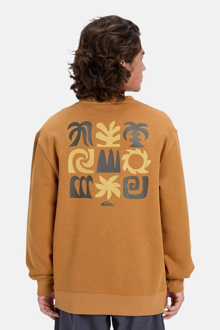 Pull-over orange de Quiksilver avec une im imique sur le dos.