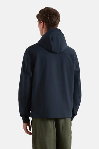 Manteau court bleu de FARAH, avec capuche, vu de derrière.