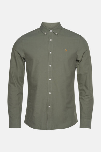 Chemise verte à manches longues de FARAH, avec col boutonné et un petit logo sur la poitrine.