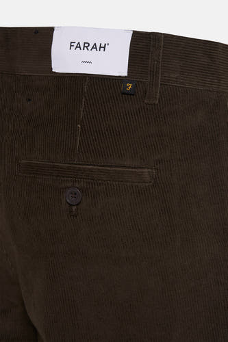 Pantalon de corduroy Kaki de FARAH, avec détail de poche à bouton et étiquette de marque.
