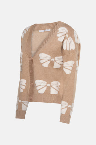 Gilet beige de HAILYS, avec un grand motif de rayures blanches et des manches longues.
