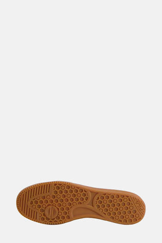 Semelle de sneaker brune de Fila, avec un motif hexagonal et une texture nervurée.