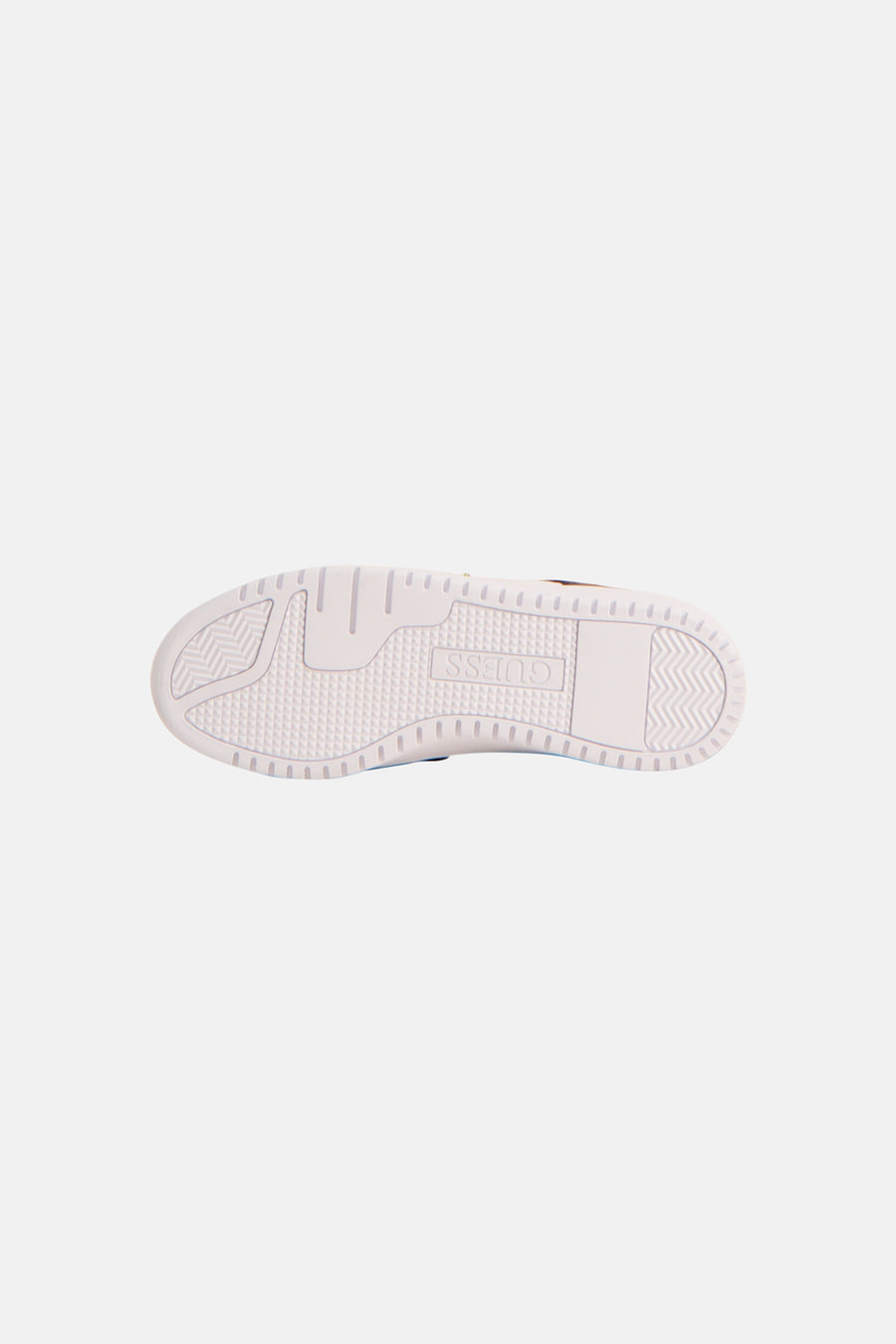 Semelle de baskets blanches Guess, avec divers motifs de texture d'adhérence et logo inversé.