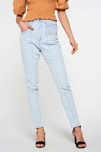 Slim jeans denim van FOUDRE by Aurélie Van Daelen, met gestikte details en zwarte hakken.

