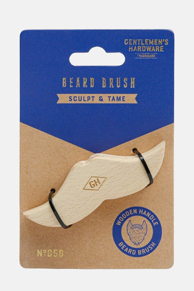 Cadeau énigmatique de Gentlemen's Hardware, avec un peigne à barbe en bois dans une emballage de carton bleu et brun.