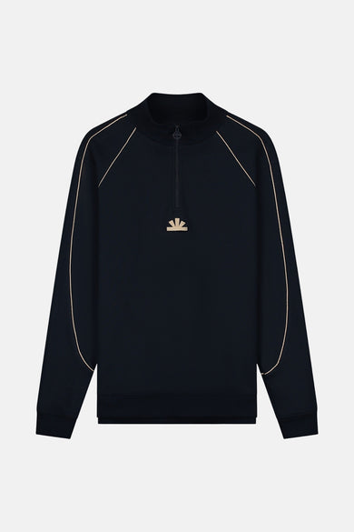 Pull-over bleu de BASELAB, avec une fermeture éclair courte et un logo beige sur la poitrine.