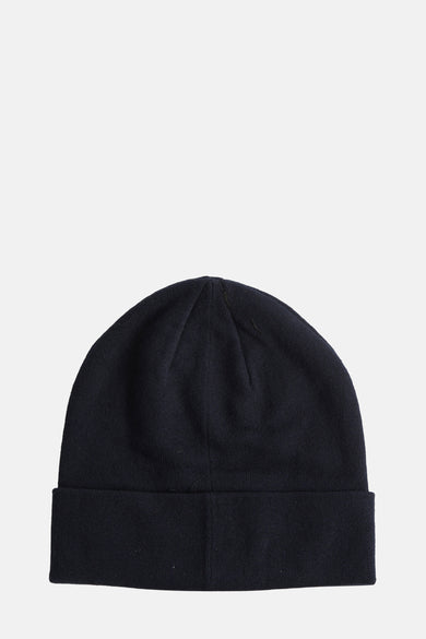 Chapeau bleu de LYLE & SCOTT, texture lisse tissée, avec un bord replié.
