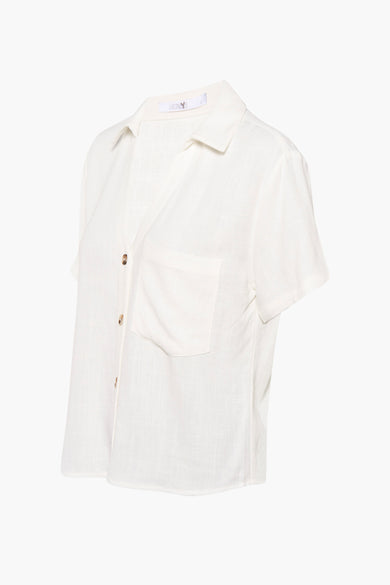 Chemise beige à manches courtes de HAILYS, tissu léger avec poche poitrine et fermeture à boutons, vue de profil latéral