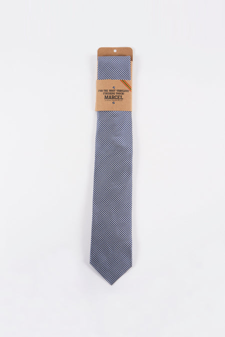 Daim bleu de Le Fabuleux Marcel de Bruxelles, avec un motif géométrique fin.