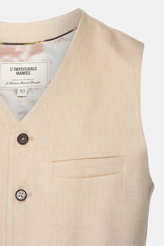 Gilet beige de Le Fabuleux Marcel de Bruxelles, avec des boutons et une poche po.