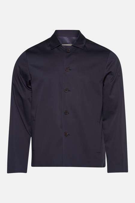 Blauwe blazer van Le Fabuleux Marcel de Bruxelles met bruine knopen en een effen ontwerp.
