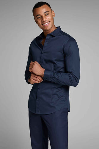 Chemise bleue à manches longues de PREMIUM by JACK & JONES, avec des poignets boutonnés et une fermeture à glissière visible.