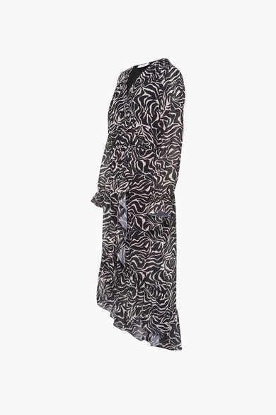 Robe noire à longues manches de HAILYS, avec un motif zébré noir et blanc frappant et des volants.
