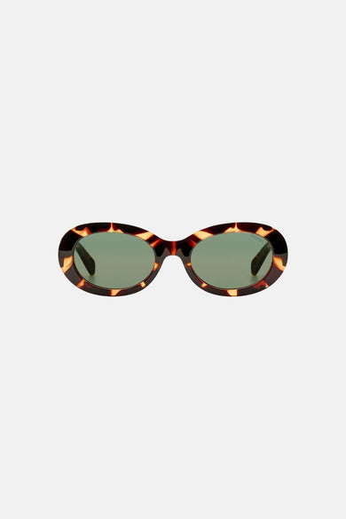 Lunettes de soleil marron KOMONO à motif écaille de tortue et verres verts.