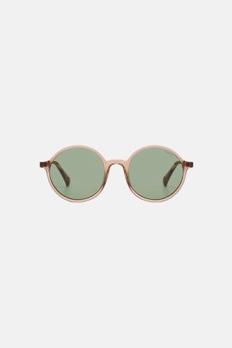Lunettes de soleil marron de KOMONO, avec verres ronds et monture marron transparente.