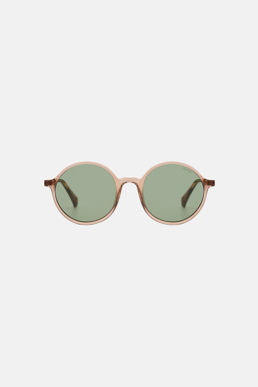 Lunettes de soleil marron de KOMONO, avec verres ronds et monture marron transparente.