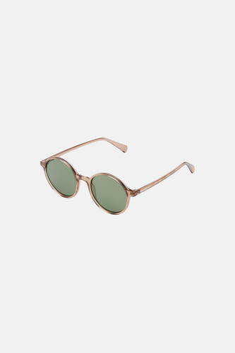 Lunettes de soleil marron KOMONO avec verres ronds et monture transparente.